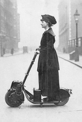 a-woman-riding-an-autoped-1916