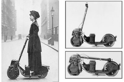 a-woman-riding-an-autoped-19161