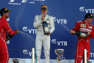 Russian Grand Prix-Bottas holds Vettel back to grab first grand prix win
